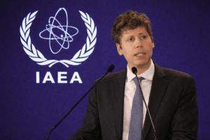 Sam Altman and IAEA logo