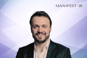 Manifest OS Logo and Founder