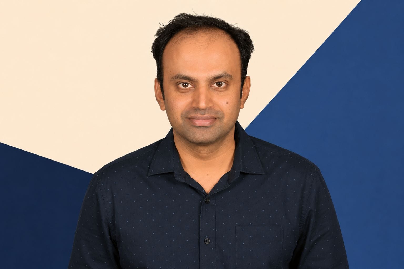 Tata Group's Martech head Varadharajan Ragunathan's portrait on a geometric background